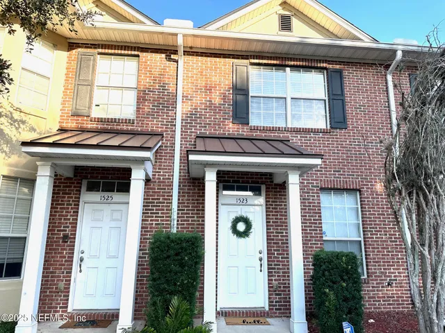 a front view of a house with a porch