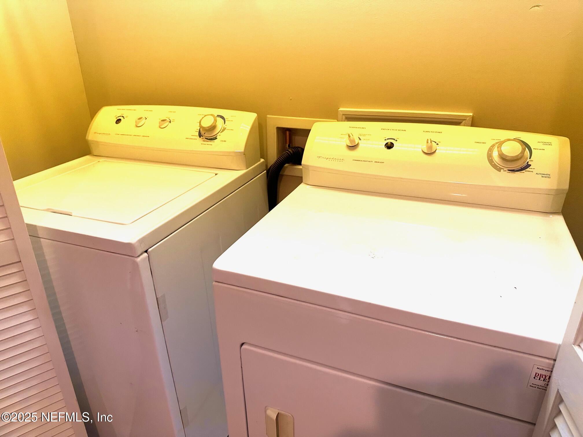 1523 Fieldview Drive Jacksonville, FL 32225 - Photo 20 of 23 a utility room with dryer and washer