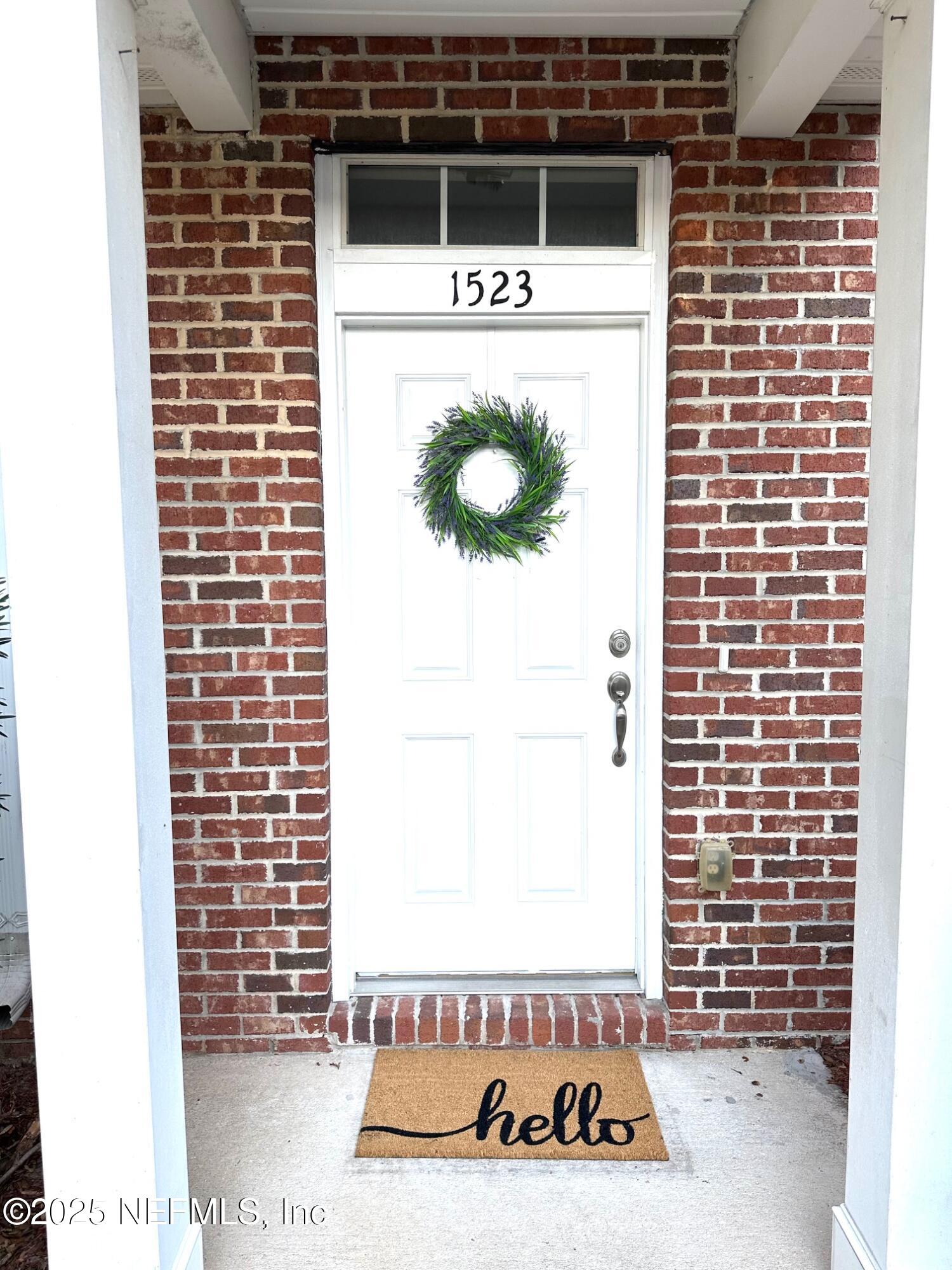 1523 Fieldview Drive Jacksonville, FL 32225 - Photo 2 of 23 a picture of a door