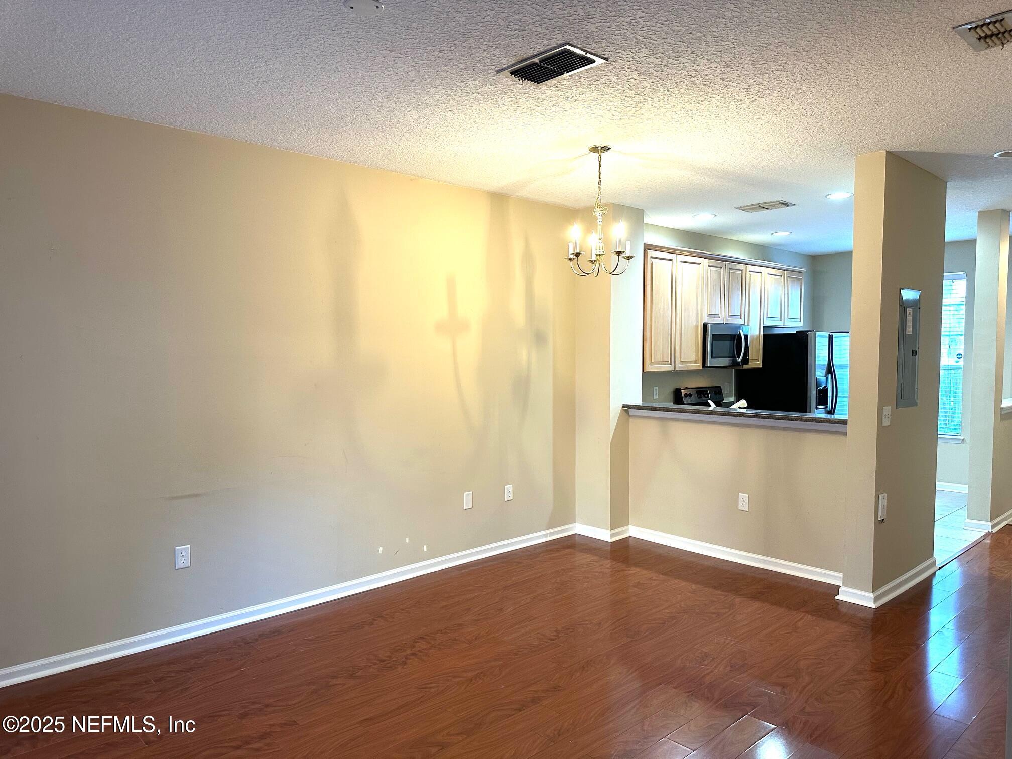 1523 Fieldview Drive Jacksonville, FL 32225 - Photo 3 of 23 a view of a kitchen with a refrigerator and a sink