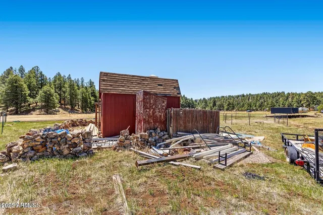 a view of a lake with a house in the background