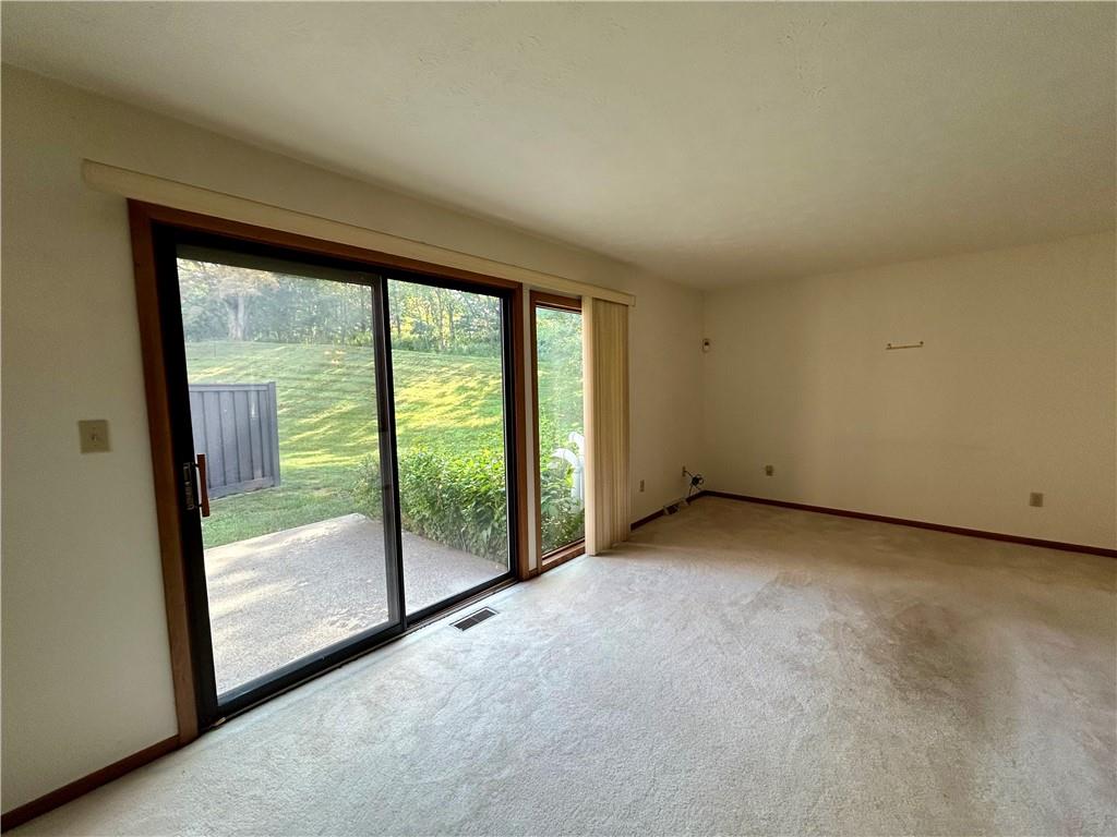 401 Spring Run Drive Monroeville, PA 15146 - Photo 15 of 31 a view of an empty room with large windows