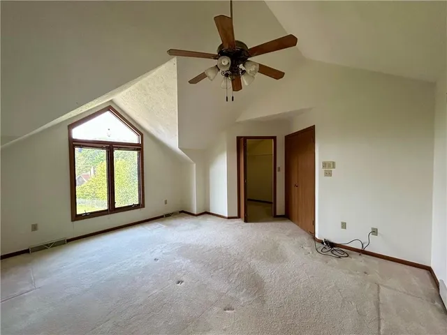 a view of a room with racks on the wall