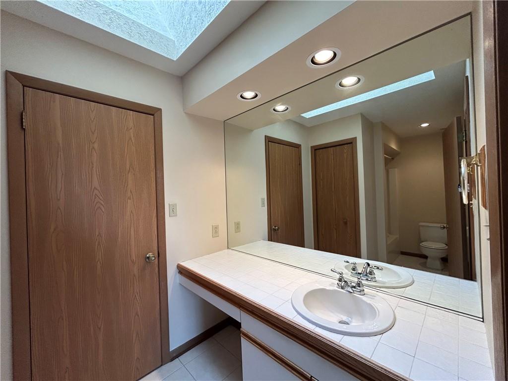 401 Spring Run Drive Monroeville, PA 15146 - Photo 21 of 31 a bathroom with a sink and a mirror