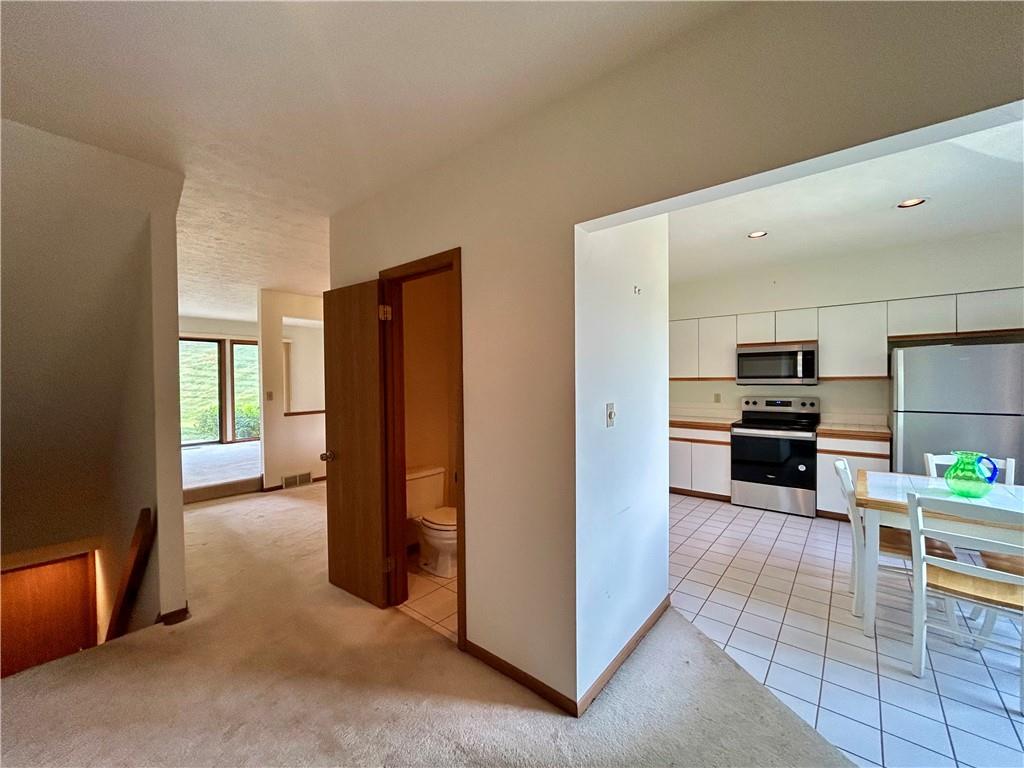 401 Spring Run Drive Monroeville, PA 15146 - Photo 3 of 31 a view of a kitchen with furniture and an oven