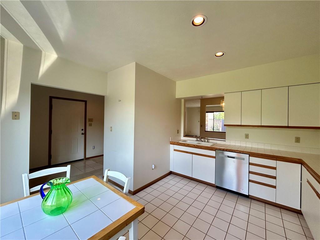 401 Spring Run Drive Monroeville, PA 15146 - Photo 7 of 31 a kitchen with a sink a stove and cabinets
