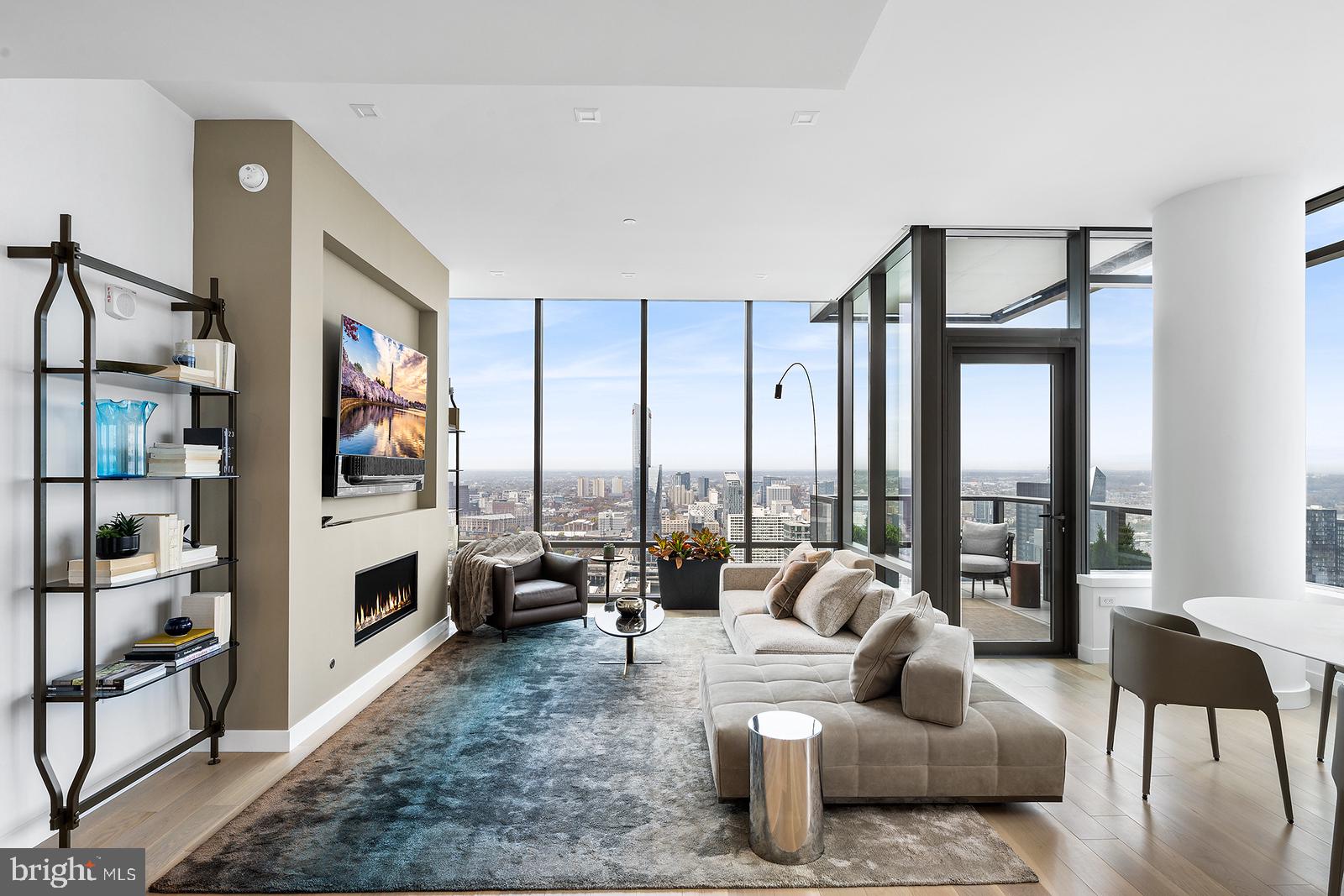 1911 Walnut Street, Unit 3003 Philadelphia, PA 19103 - Photo 5 of 27 a living room with furniture or couch and a large window
