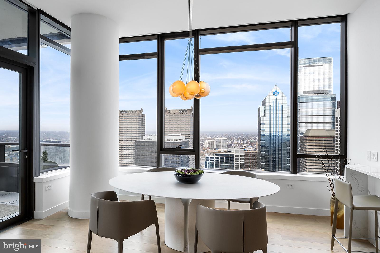 1911 Walnut Street, Unit 3003 Philadelphia, PA 19103 - Photo 8 of 27 a kitchen with a table and chairs