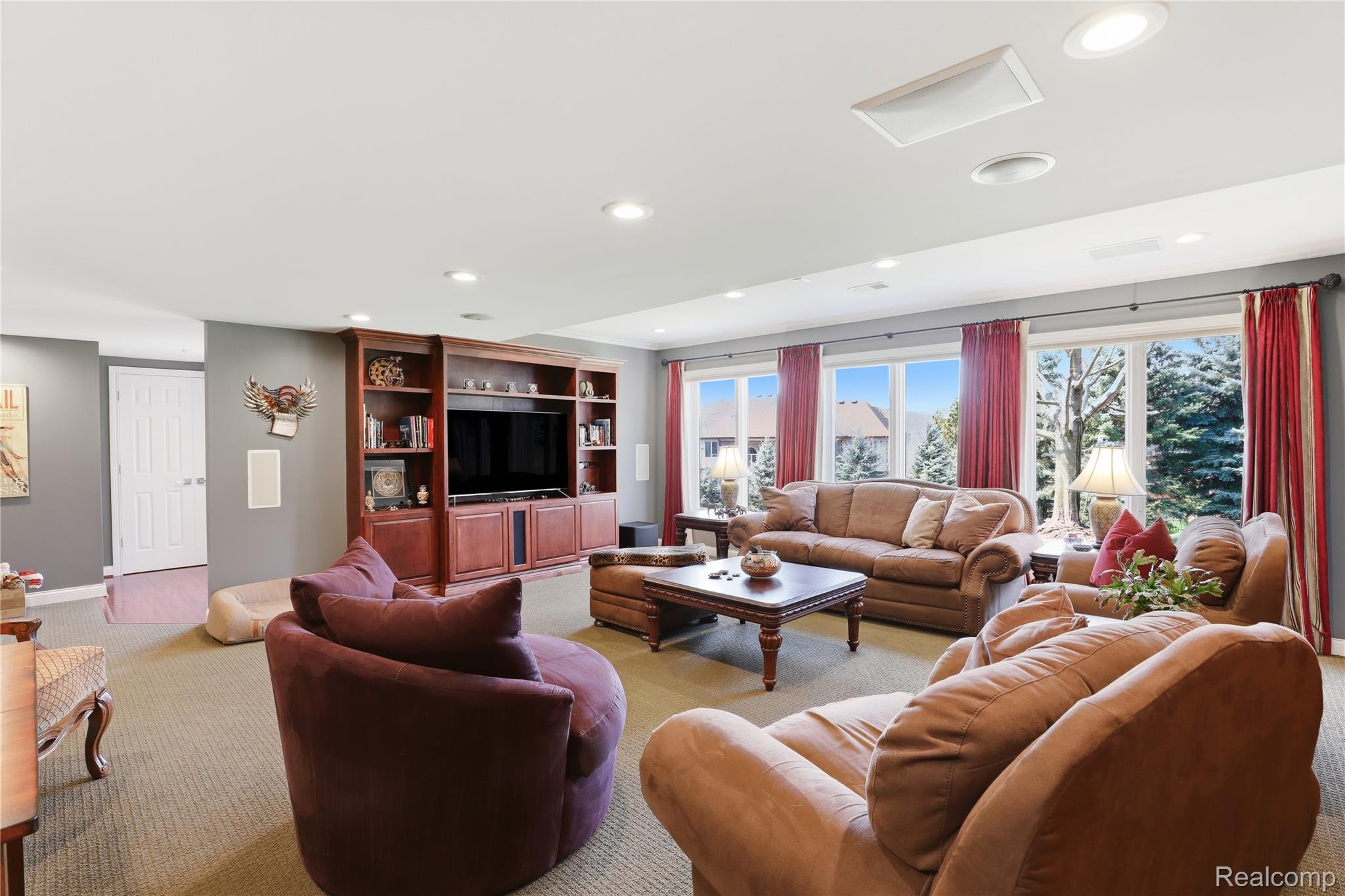 668 Springview Drive Rochester, MI 48307 - Photo 64 of 90 Carpeted living room with recessed lighting