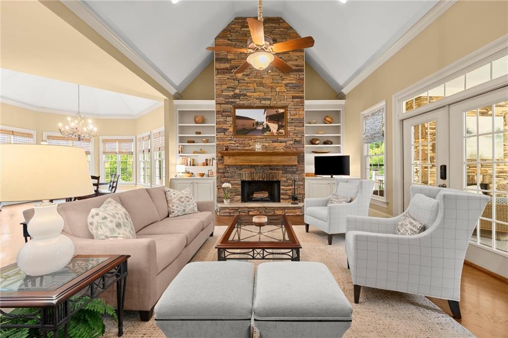 322 Edwards Brook Lane Canton, GA 30115 - Photo 21 of 99 a living room with furniture fireplace and a large window