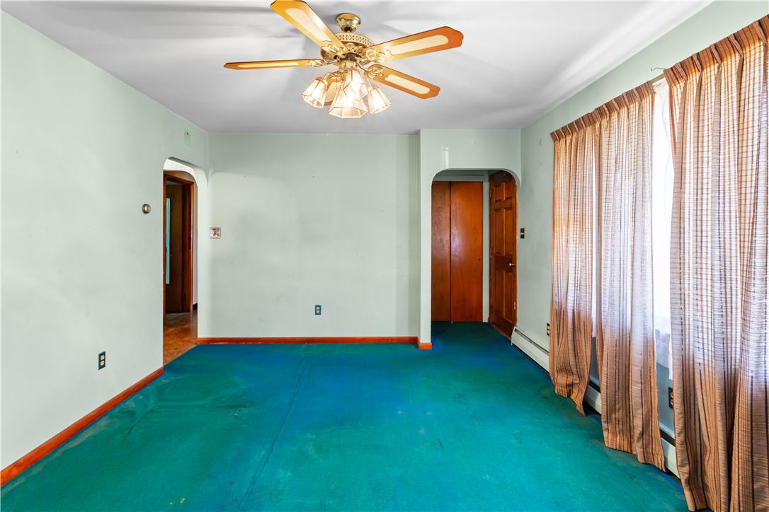 479 Cherry Hill Road Nazareth, PA 18064 - Photo 5 of 25 Arched doorways and classic wood baseboards define this functional interior living area.