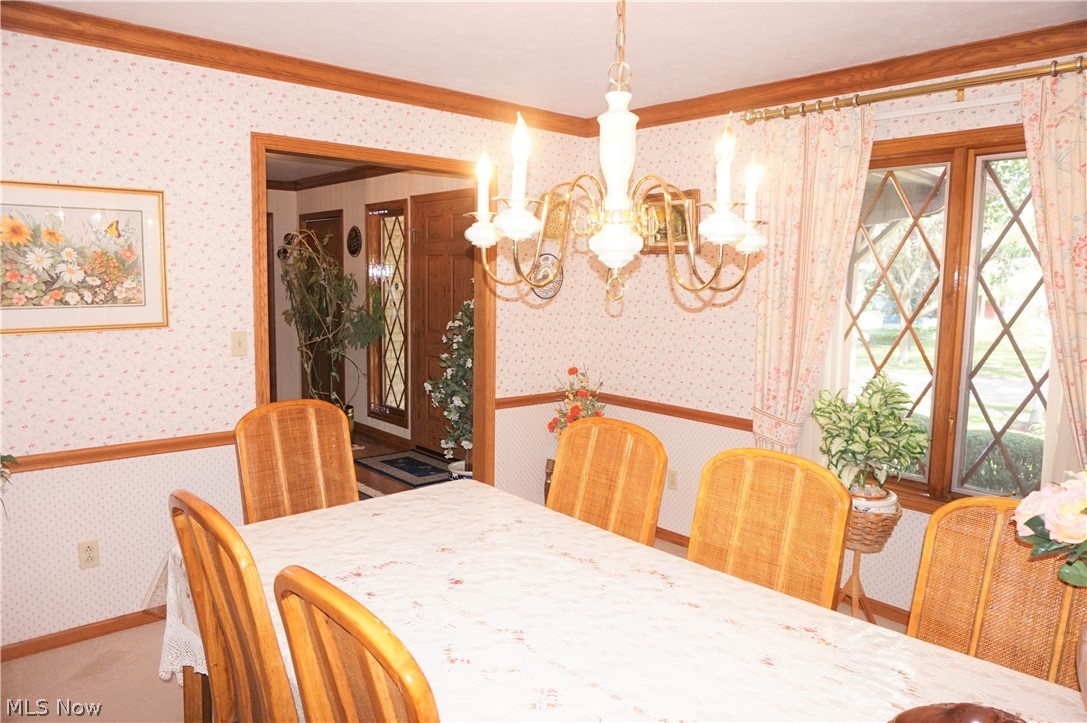 Formal dining room to the left of foyer