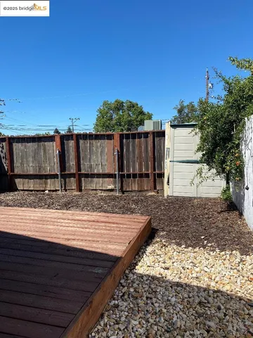 a kitchen with stainless steel appliances granite countertop a stove and white cabinets