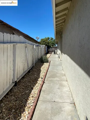 a view of backyard with garage