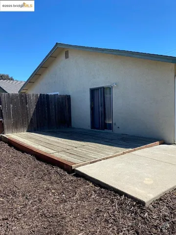 a entryway of a house with a yard