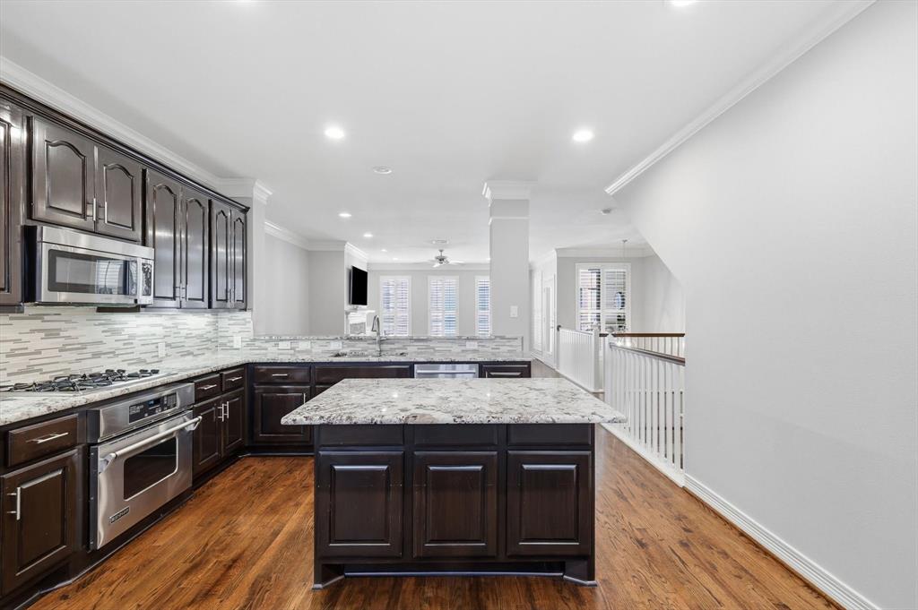 2615 Colby Street, Unit B Dallas, TX 75204 - Photo 17 of 39 2nd floor kitchen overview to living room.