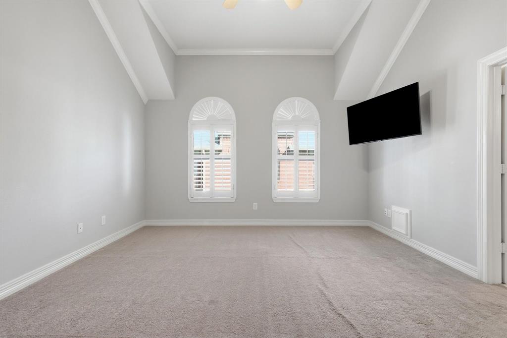 2615 Colby Street, Unit B Dallas, TX 75204 - Photo 21 of 39 3rd Floor primary bedroom with TV