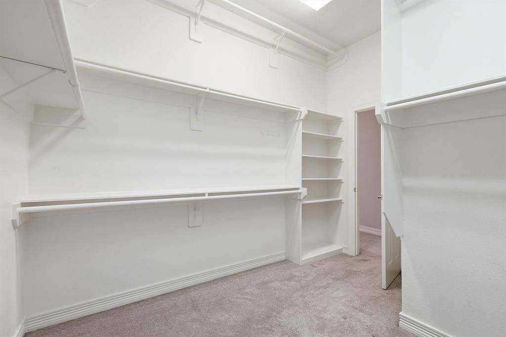 2615 Colby Street, Unit B Dallas, TX 75204 - Photo 25 of 39 Spacious closet with light carpet