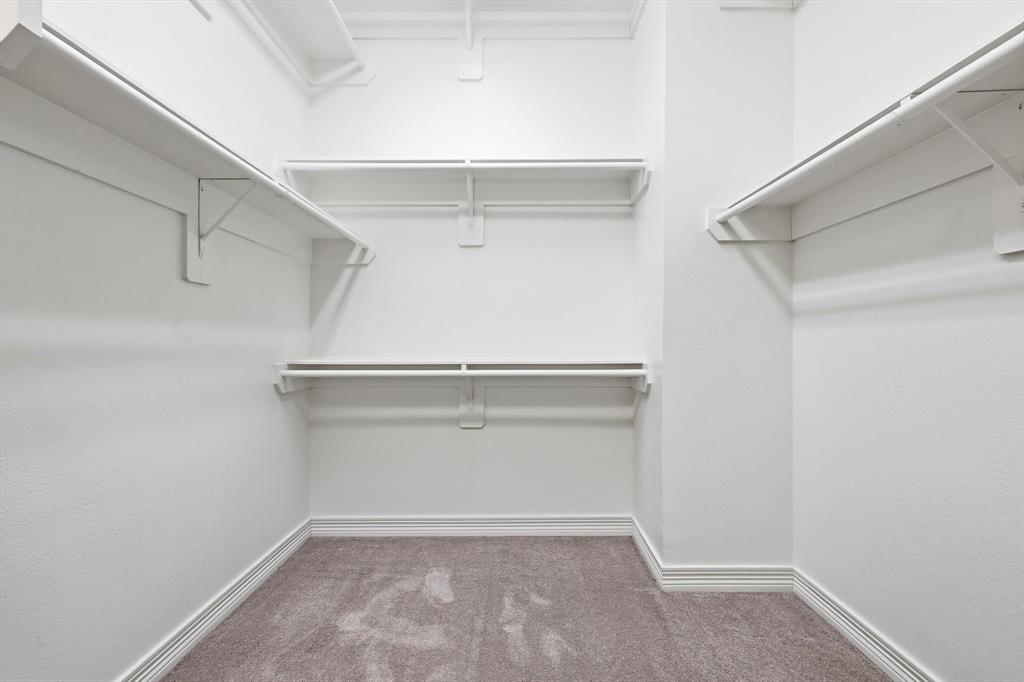 2615 Colby Street, Unit B Dallas, TX 75204 - Photo 26 of 39 Spacious closet featuring light carpet