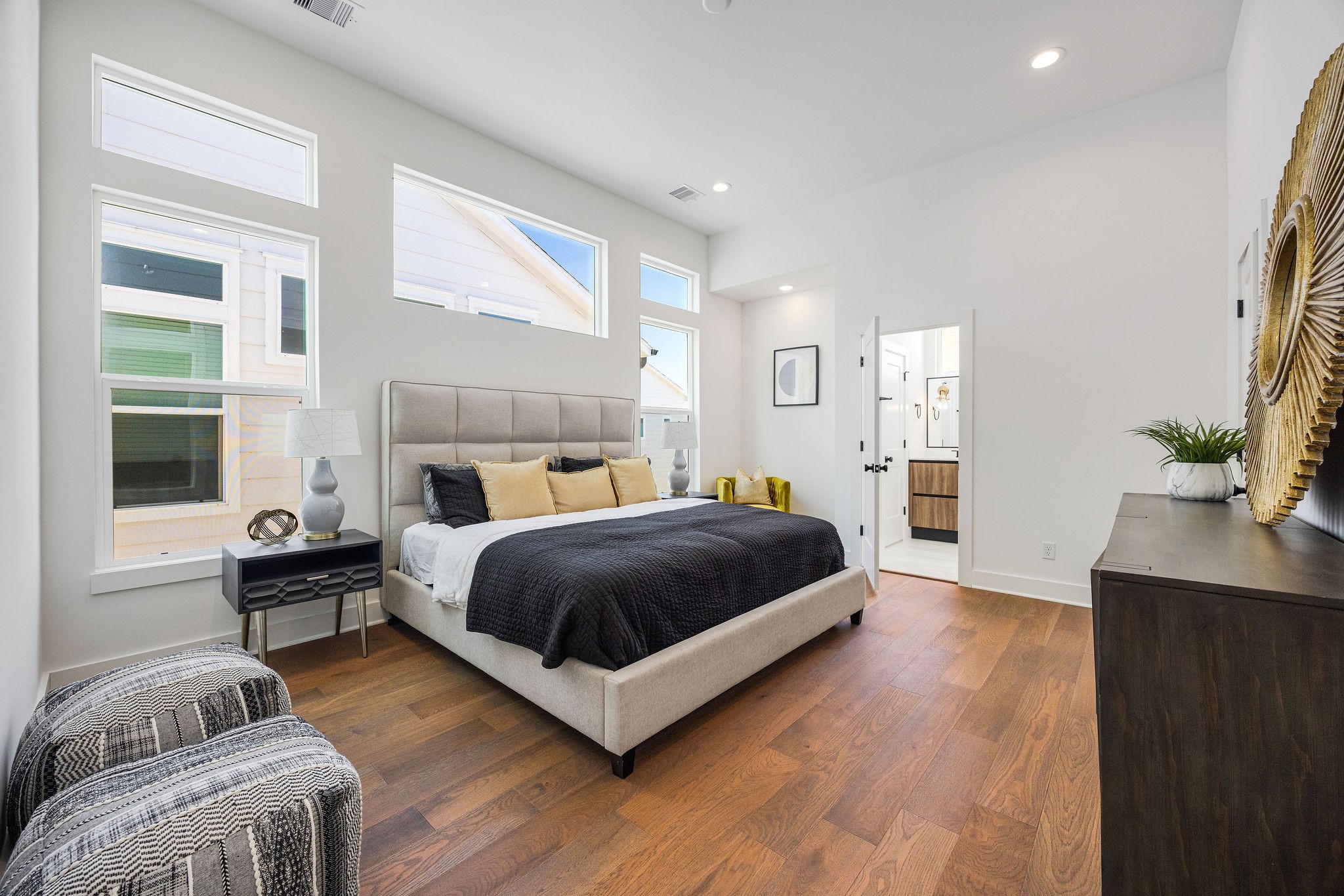 303 Marcella Street, Unit F Houston, TX 77091 - Photo 3 of 29 Spacious primary bedroom flooded with lots of natural light, located on the third floor.