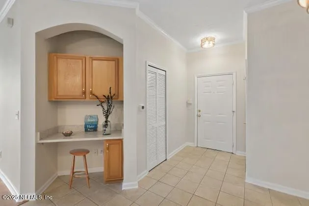 a view of kitchen and cabinets