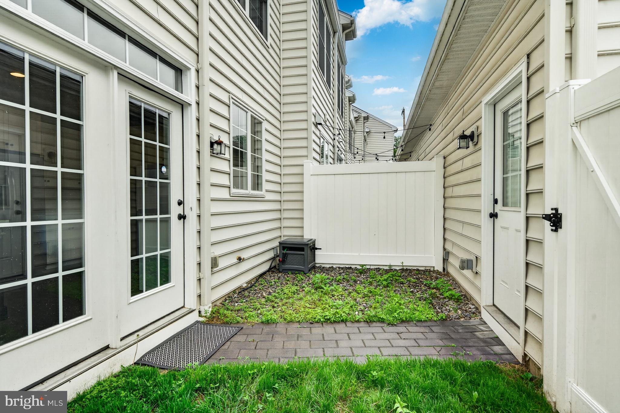 610 D Street Kennett Square, PA 19348 - Photo 24 of 24 Fenced/ gated back yard to detached garage