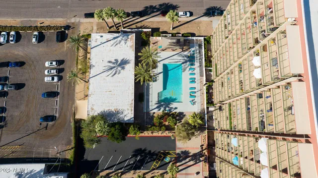 a view of a house with a flower garden