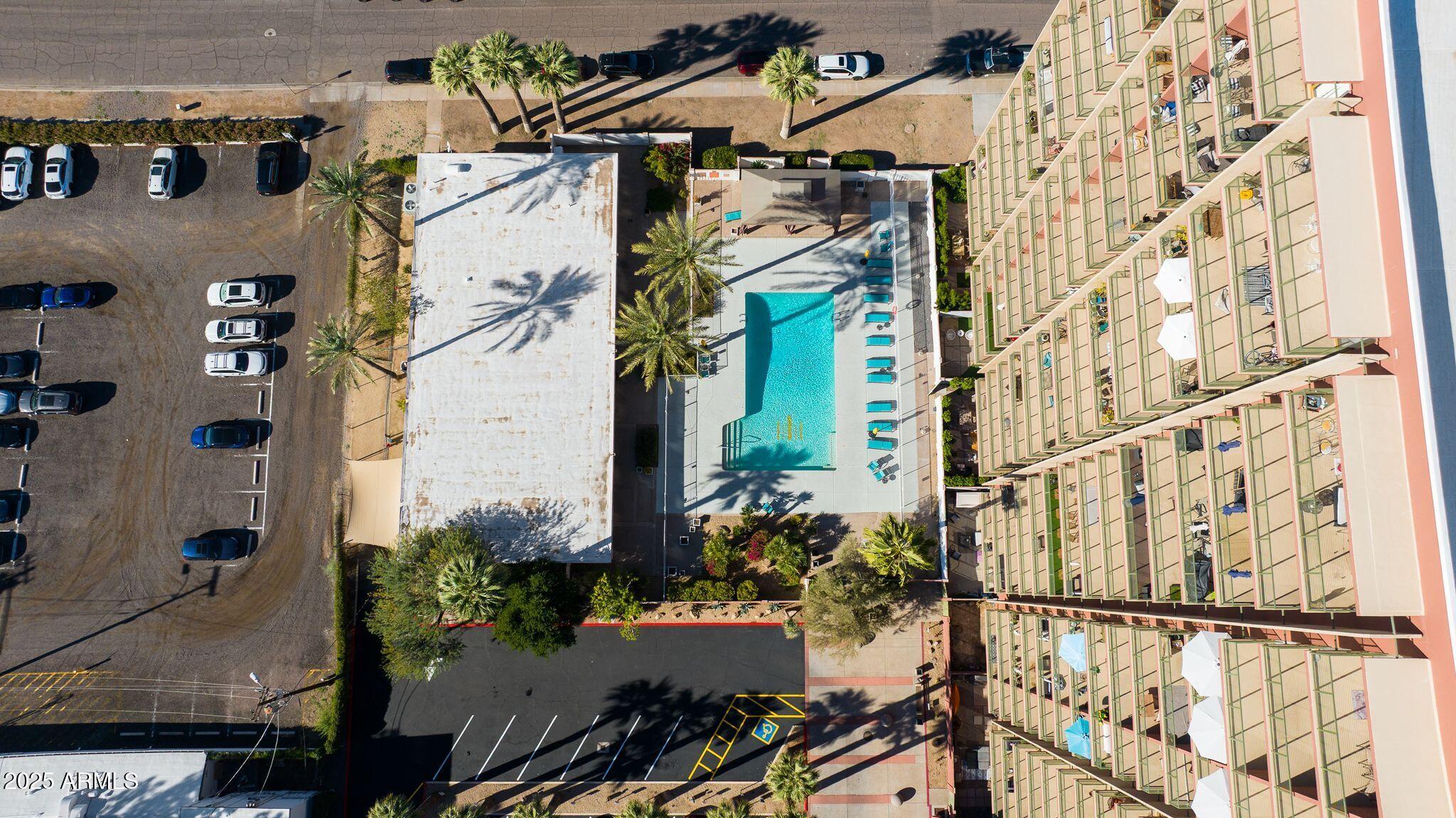 4750 North Central Avenue, Unit 3J Phoenix, AZ 85012 - Photo 11 of 11 a view of a house with a flower garden