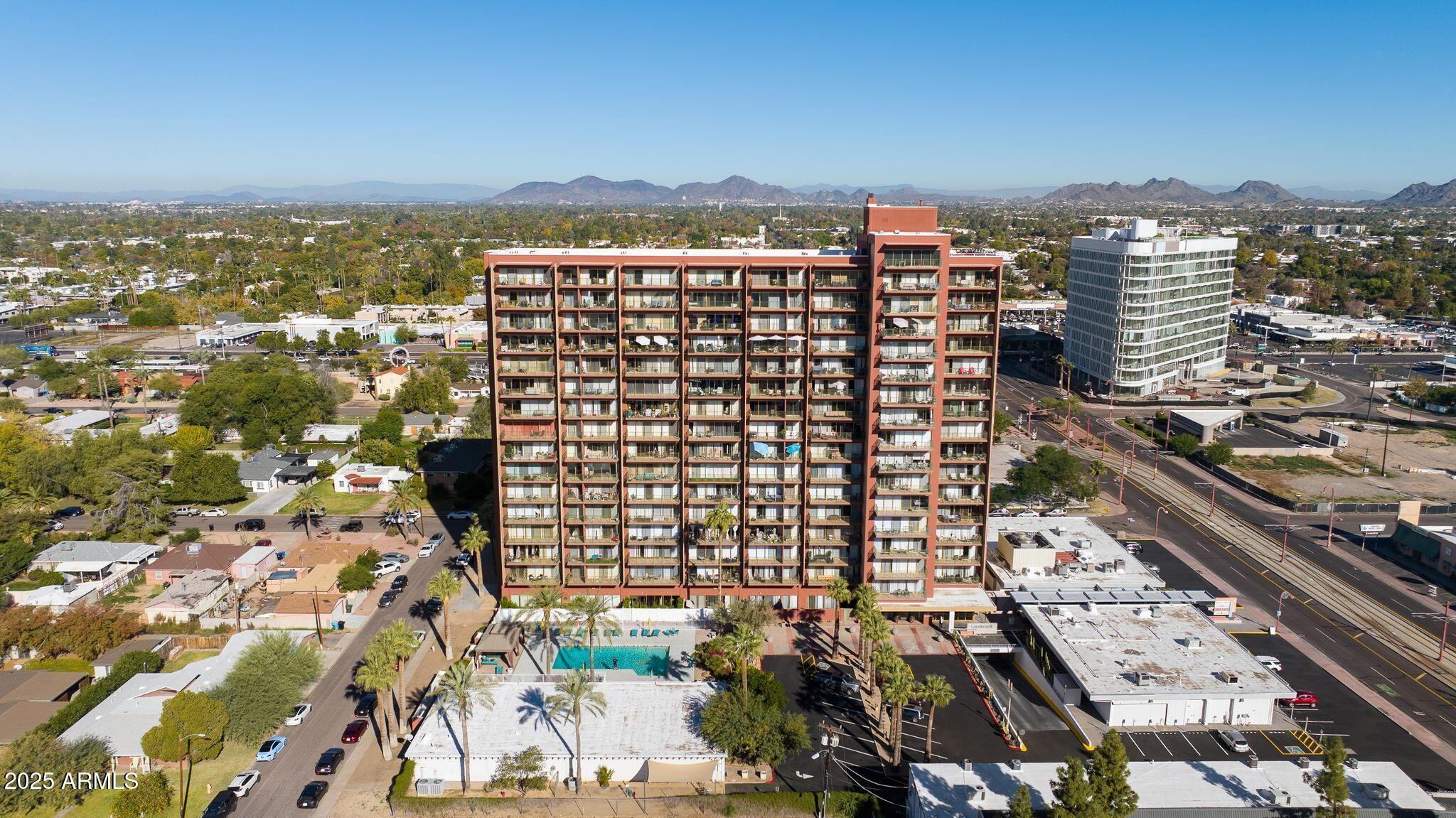 4750 North Central Avenue, Unit 3J Phoenix, AZ 85012 - Photo 8 of 11 a view of a city with tall buildings
