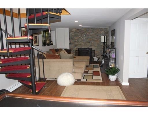 492 Brook Street Framingham, MA 01701 - Photo 11 of 15 a view of living room kitchen with stainless steel appliances