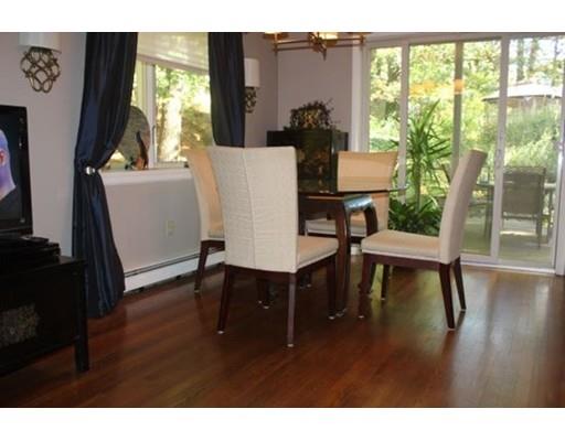 492 Brook Street Framingham, MA 01701 - Photo 2 of 15 a living room with furniture and a table