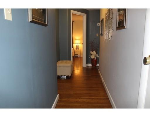 492 Brook Street Framingham, MA 01701 - Photo 6 of 15 a view of entryway and hall with wooden floor