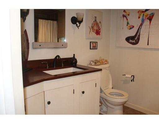492 Brook Street Framingham, MA 01701 - Photo 7 of 15 a bathroom with a granite countertop sink and a mirror