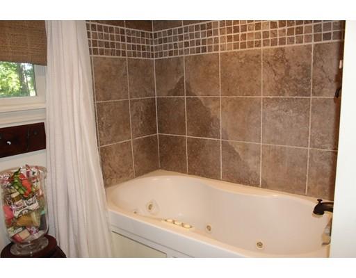 492 Brook Street Framingham, MA 01701 - Photo 8 of 15 a bathroom with a bath tub