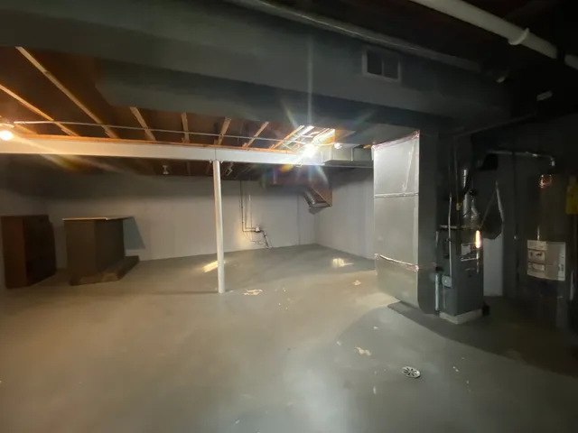 a view of backyard with swimming pool