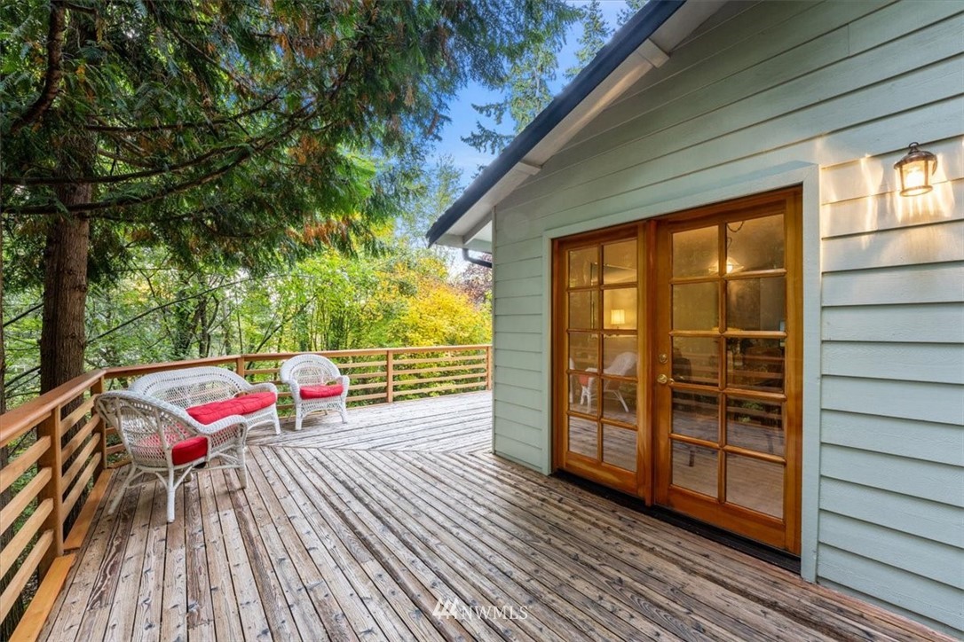 22608 31st Avenue Southeast Bothell, WA 98021 - Photo 22 of 36 a view of balcony with wooden floor and seating space