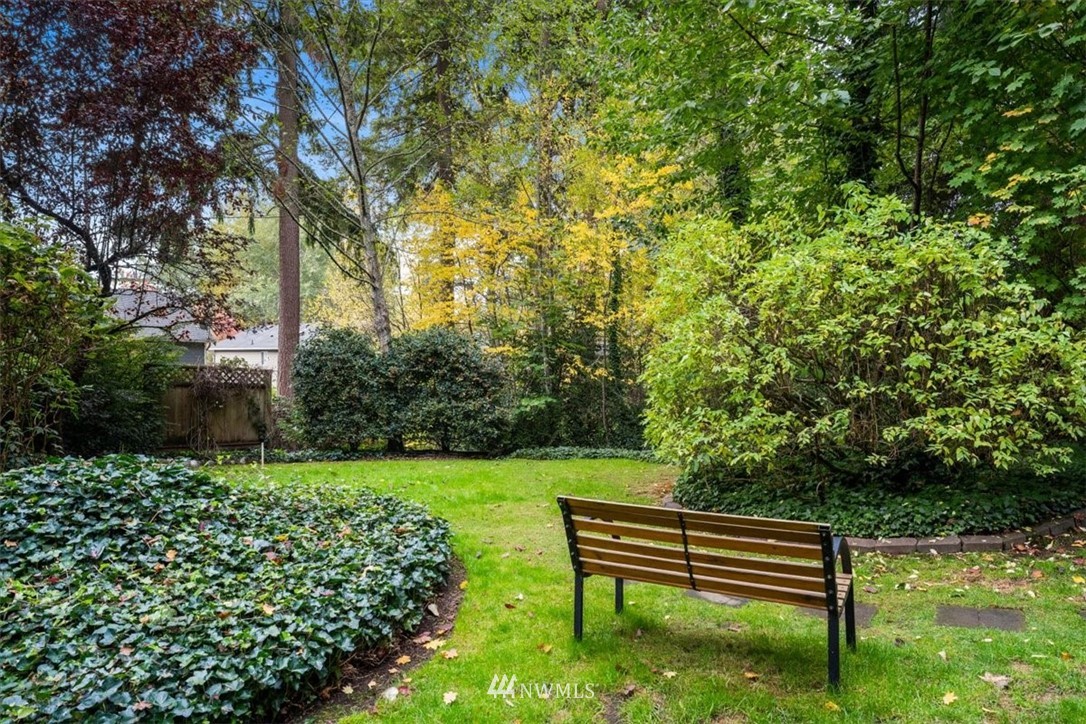 22608 31st Avenue Southeast Bothell, WA 98021 - Photo 28 of 36 a view of a bench in a garden