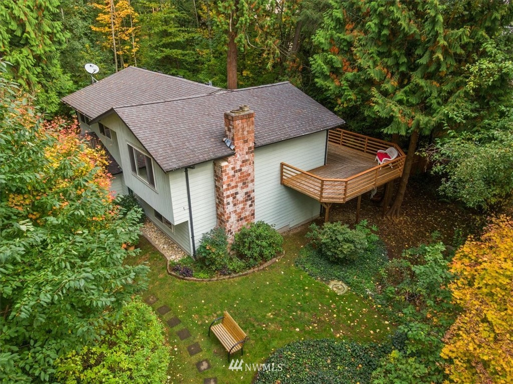 22608 31st Avenue Southeast Bothell, WA 98021 - Photo 33 of 36 an aerial view of a house with garden space and trees