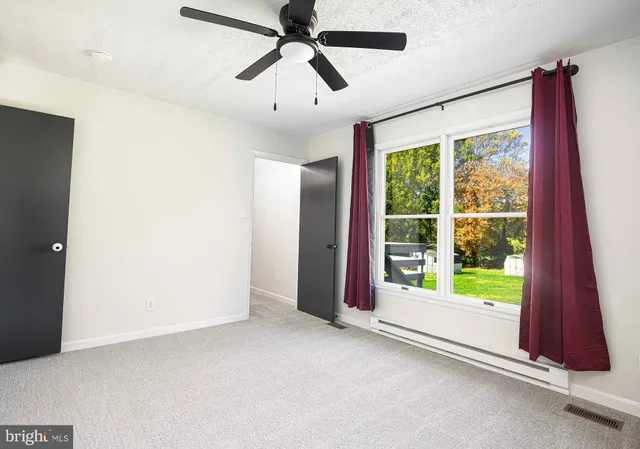 a view of small space with racks on the wall