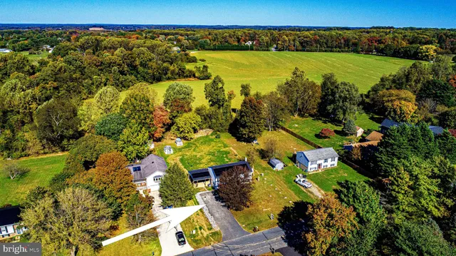 a view of a garden with an outdoor space