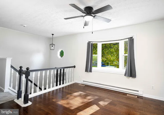 a kitchen with stainless steel appliances a refrigerator microwave and sink