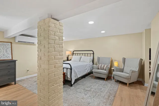 a bedroom with a bed and furniture