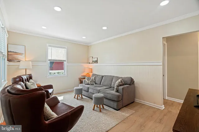 a living room with furniture and a couch