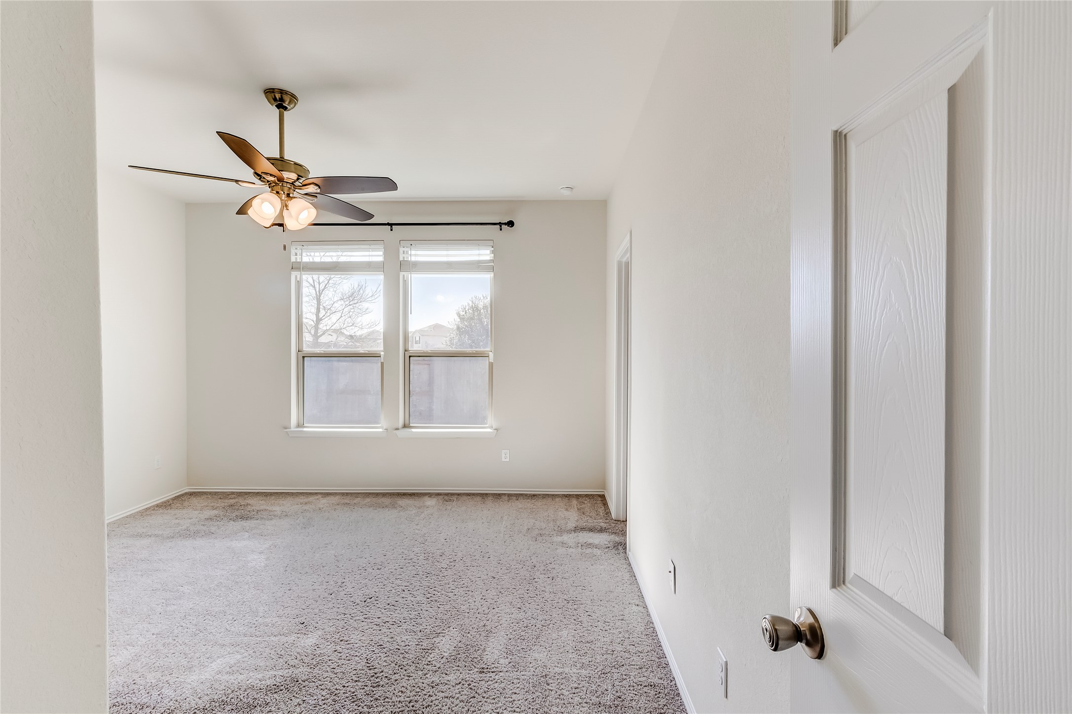 11617 Amber Stream Lane Manor, TX 78653 - Photo 13 of 39 an empty room with a window