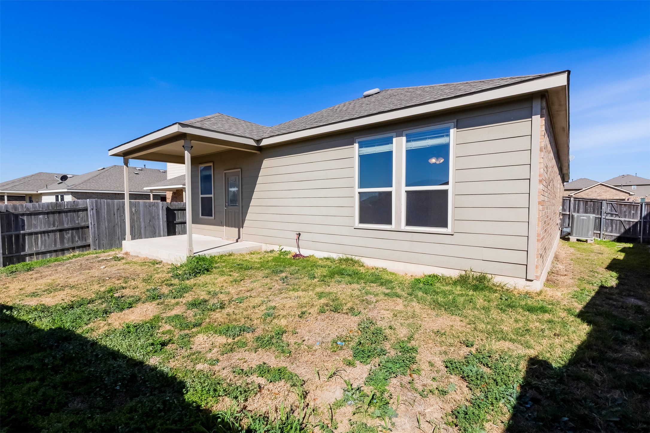 11617 Amber Stream Lane Manor, TX 78653 - Photo 25 of 39 a house with a outdoor space