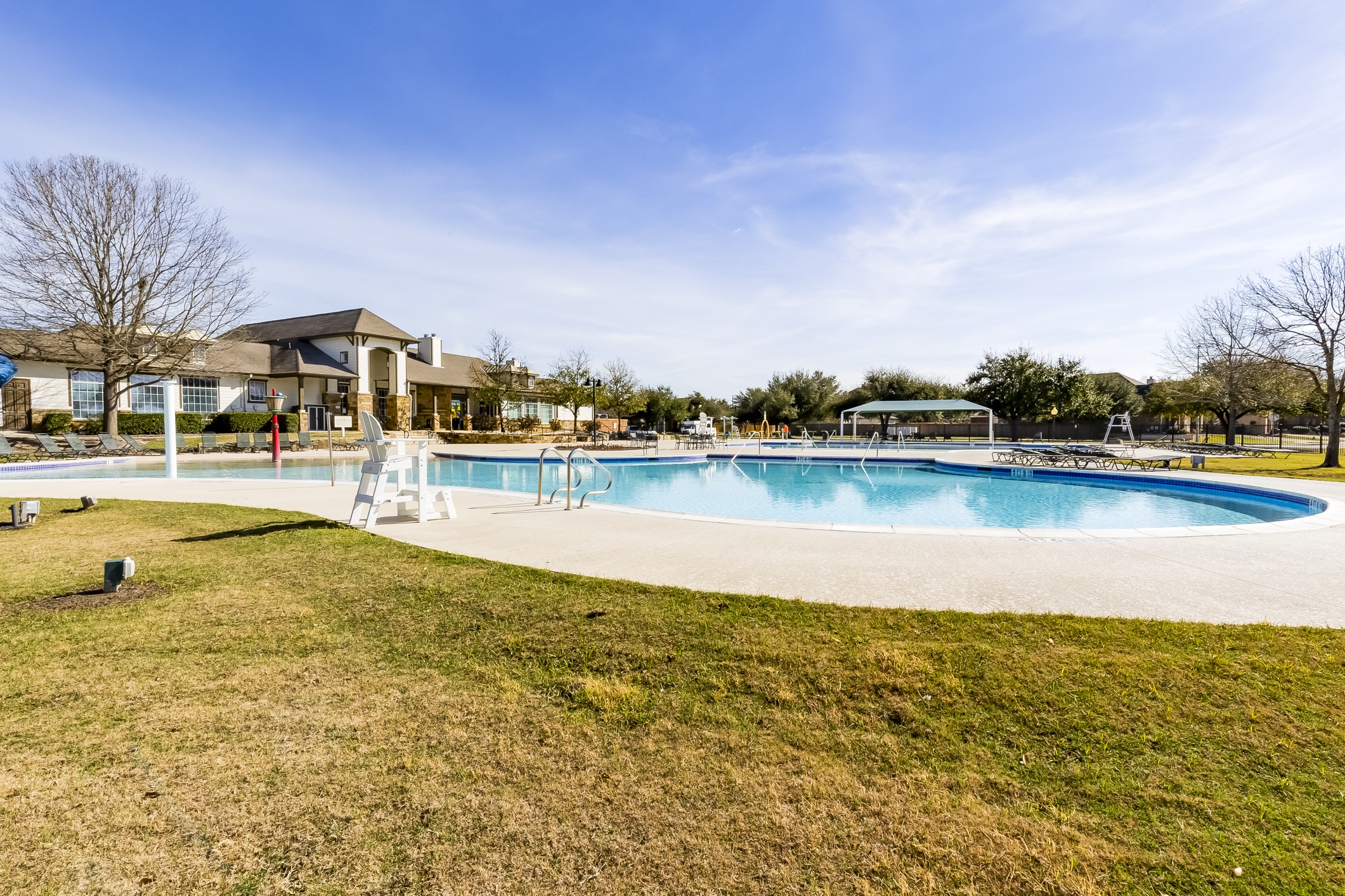 11617 Amber Stream Lane Manor, TX 78653 - Photo 35 of 39 a view of a lake with houses