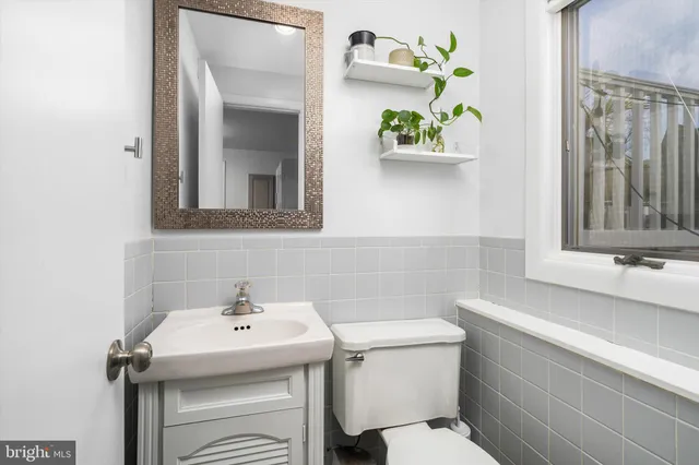 a bathroom with a sink and a toilet