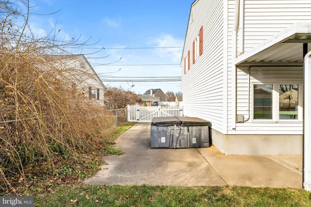 a view of a back yard of the house