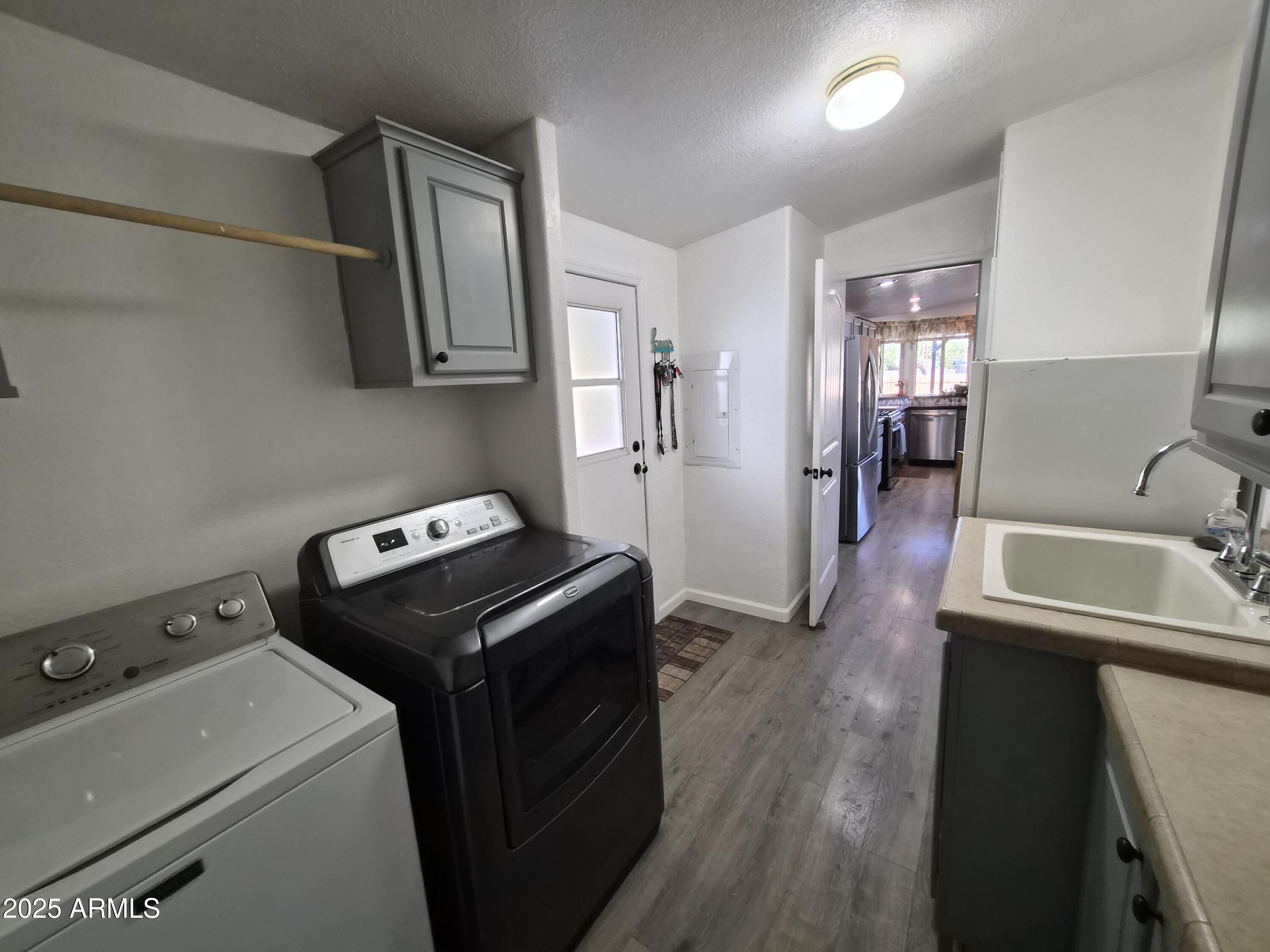 51033 North Mockingbird Road Wickenburg, AZ 85390 - Photo 17 of 51 a room with storage and utility