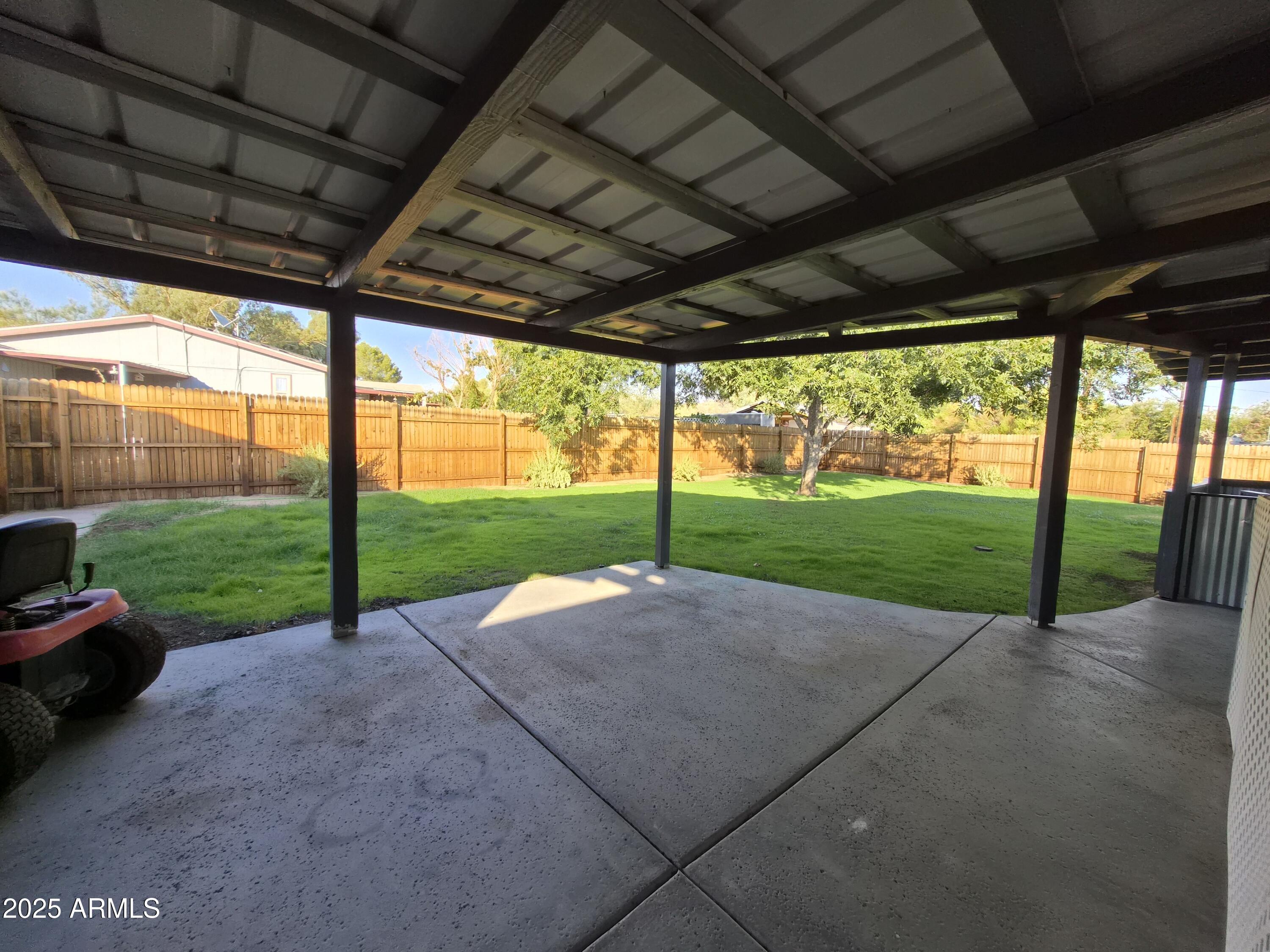 51033 North Mockingbird Road Wickenburg, AZ 85390 - Photo 33 of 51 a view of a house with backyard
